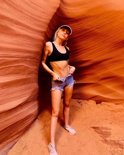 Miley Cyrus in Sedona Wearing a Black Top with Jeans