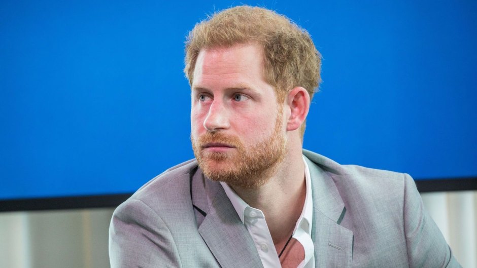 Prince Harry Wearing a Gray Suit While Giving a Talk