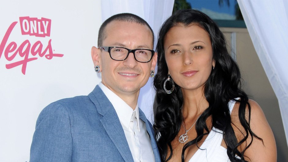 chester bennington wore a white button down t shirt and a light blue blazer and his then-wife talinda work a white dress at a red carpet event in 2012 chester bennington's widow talinda is engaged