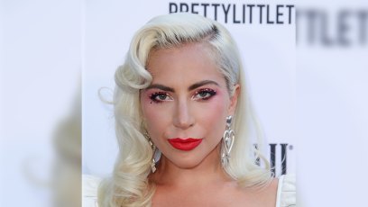 lady gaga wears her blonde hair in vintage old hollywood curls and her makeup look featured a red lip and she accessorized with diamond earrings at the 2019 daily front row fashion awards lady gaga and boyfriend daniel horton go on a date to a cure concert