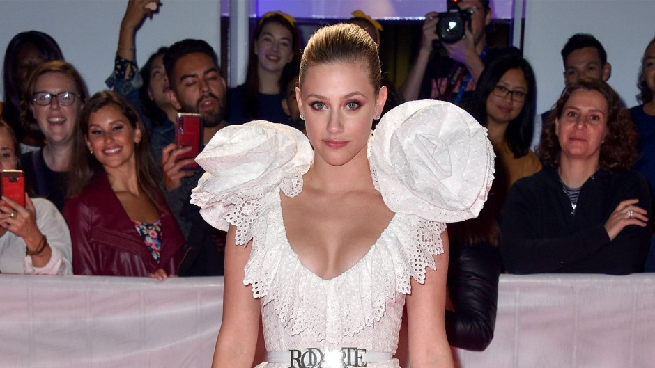 lili reinhart wears an angelic white dress at the red carpet premiere at the Toronto International Film Festival in Canada