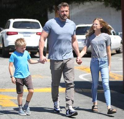 Ben Affleck Wearing a Blue Shirt While Holding Hands With His 2 Kids