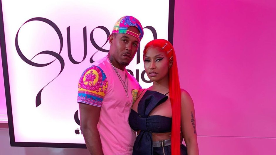 Kenneth Petty Wearing Jeans and a t-Shirt With Nicki Minaj in a Black Dress