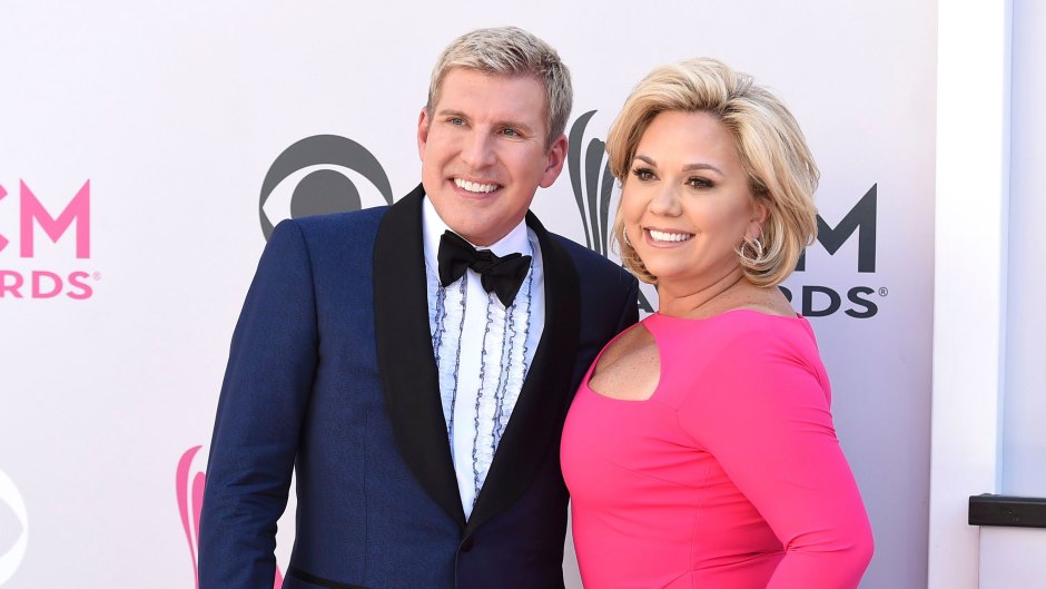 Todd Chrisley Wearing a Suit With His Wife in Pink