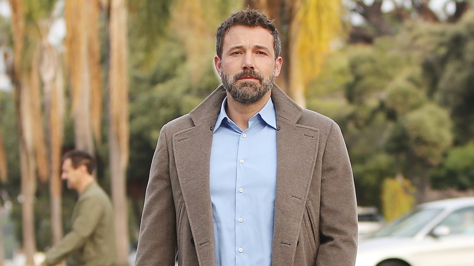 ben affleck wears a blue button down shirt with a brown jacket, jeans, and navy blue shoes ben affleck appears drunk leaving unicef masquerade ball