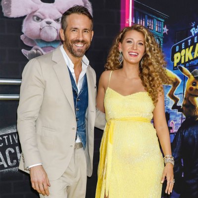 blake lively shows off her baby bump during pregnancy with baby no. 3 in a bright yellow dress with husband ryan reynolds who is wearing a khaki suit at the red carpet premiere for his film 'detective pikachu' May 2019