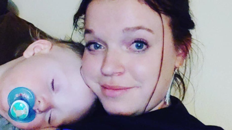 maddie brown selfie while axel sleeps on her shoulder