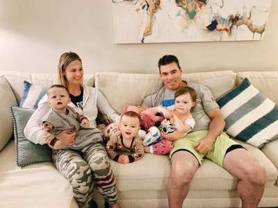 meghan king edmonds and jim edmonds post on the couch with their three children