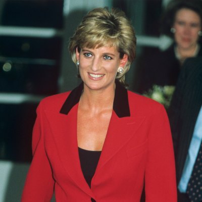 princess diana wears black top underneath a red blazer wiht black lapels at Childline Appeal, Savoy Hotel, London, Britain in january 1996
