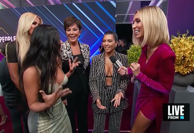 Kim Kardashian Interrupts Sister Kourtney During Red Carpet Interview