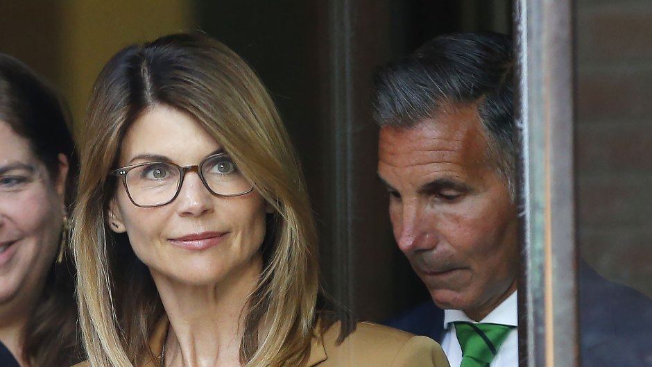 Lori Loughlin Wearing a Brown Suit With Her Glasses On