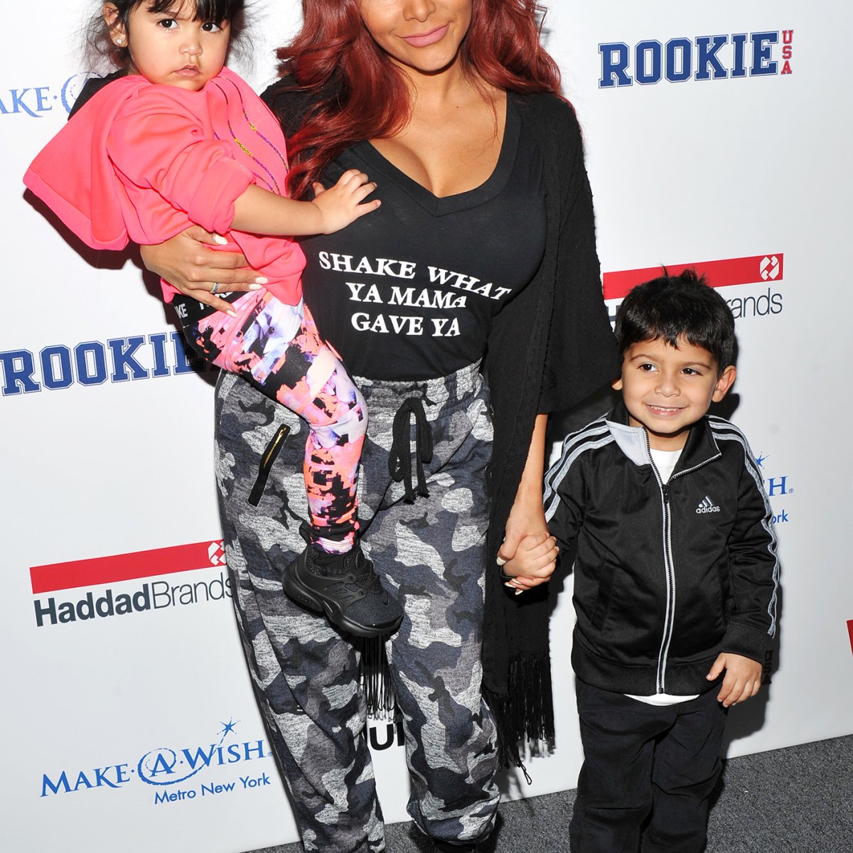 Jersey Shore's Snooki drops her trademark 'poof' for a sleek new