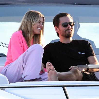 Scott Disick Wearing a Black Shirt While Wrapping His Arm Around Sofia Richie
