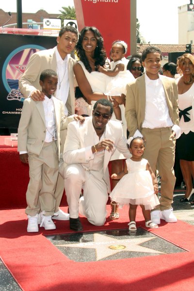 diddy and kim porter posed with their family at a red carpet event in 2008