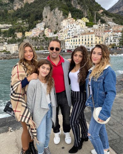 fans roasted rhonj star joe giudice for standing on his tippy toes in photo with daughters
