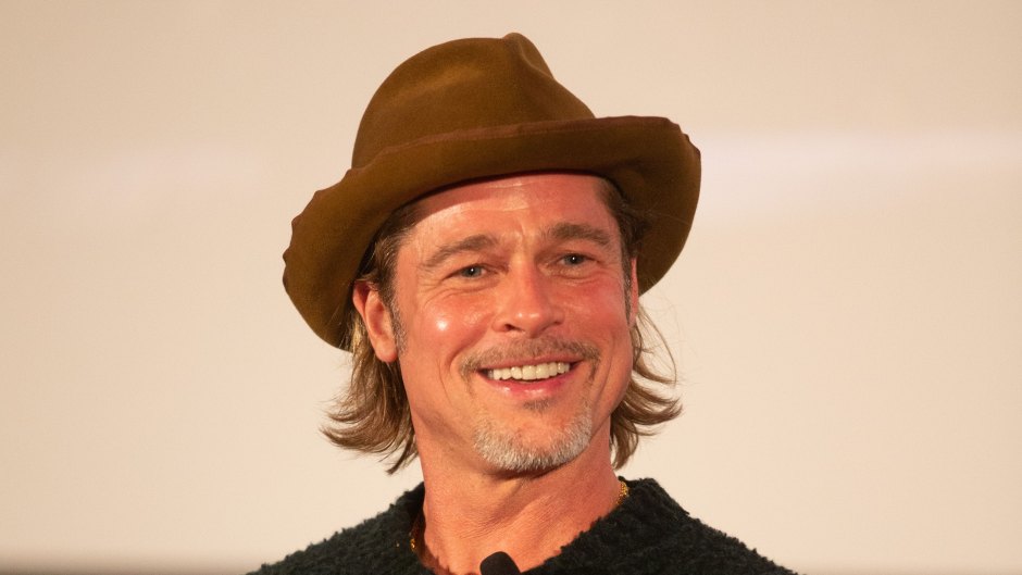 Brad Pitt Wearing a Hat With a Crowd of People in LA