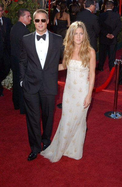 Brad Pitt Wearing a Tuexedo While Jennifer Aniston Wears a White Dress