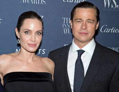 Angelina Jolie Wearing a Black Dress With Brad Pitt