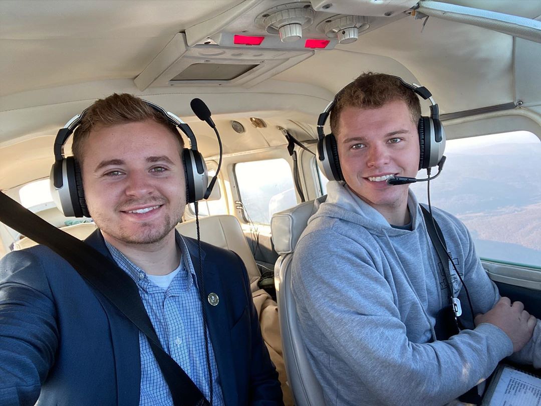 Jedidiah and Jeremiah Duggar in a Plane