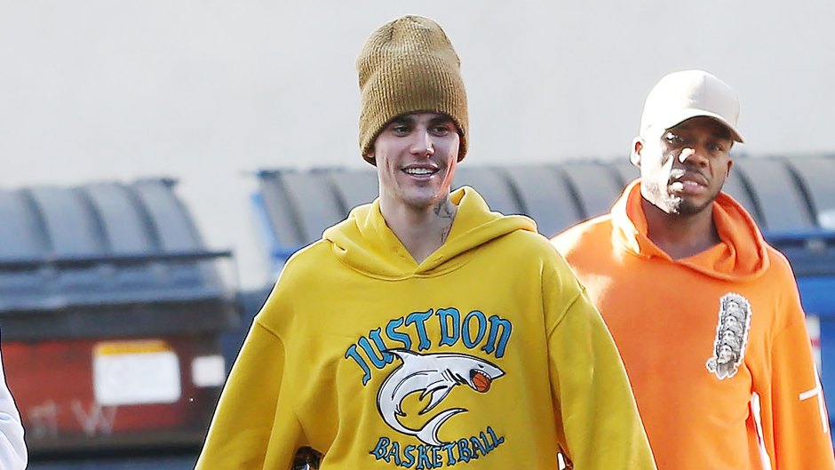 Justin Bieber Wearing a Yellow Hoodie