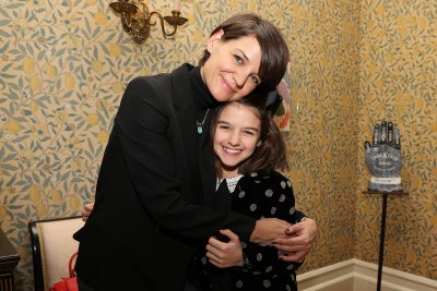 Suri Cruise and Katie Holmes Hugging at an Event