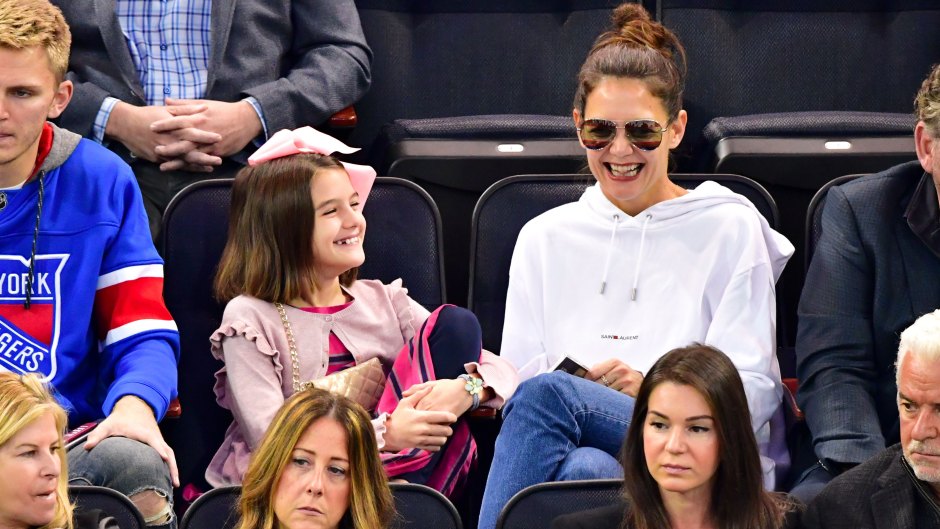 Suri Cruise Smiling at a Hockey Game With Katie Holmes