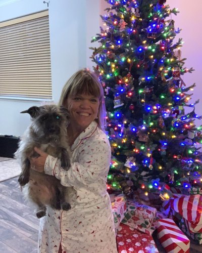 amy roloff with her dog in her new home