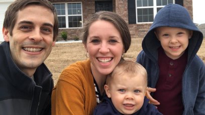 jill duggar derick dillard with sons israel and samuel in front of their house