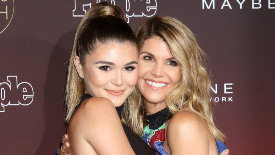 lori loughlin and her daughter olivia jade hugging at a people's ones to watch event
