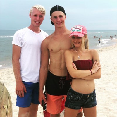 micah plath with ethan and moriah on the beach