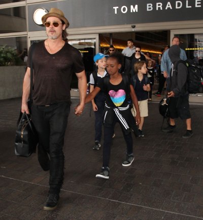 Brad Pitt Wearing a T-Shirt With His Kids