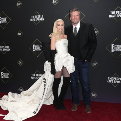Blake Shelton Wearing a Suit With Gwen Stefani In a White Dress