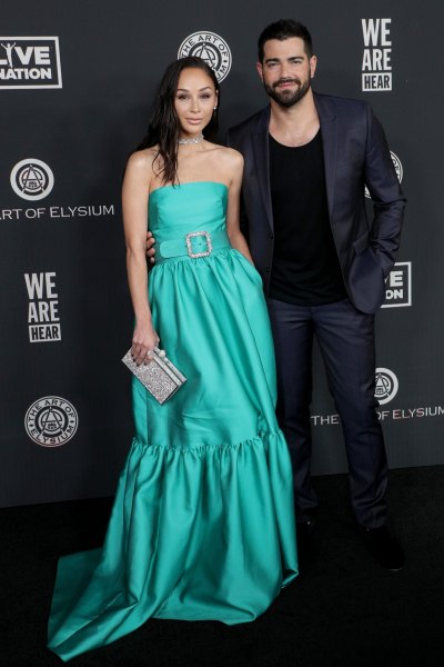 Cara Santana Wearing a Green Dress With Jesse Metcalfe