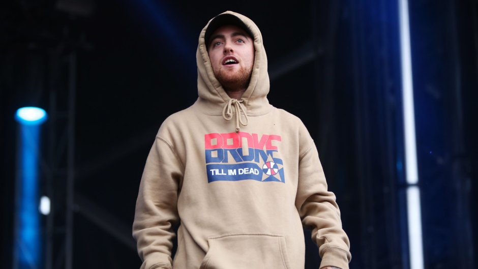 Mac Miller Wearing a Sweatshirt on Stage