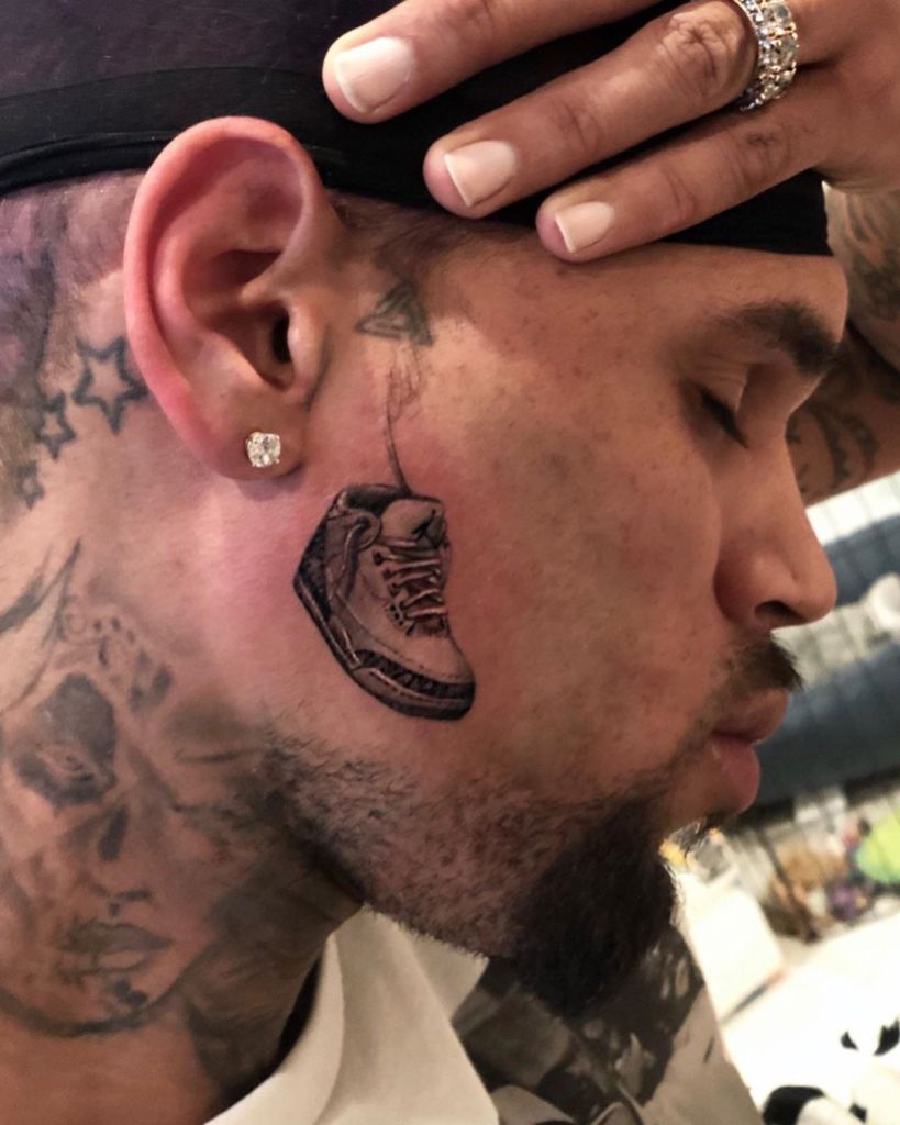 Chris Brown Debuts Nike's Air Jordan 3 Tattoo on His Face Photo