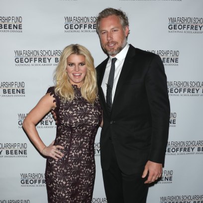 Jessica Simpson Wearing a Black Dress With Eric Johnson in a Suit