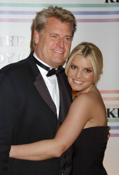 Jessica Simpson Wearing a Black Dress With Her Dad Joe Simpson