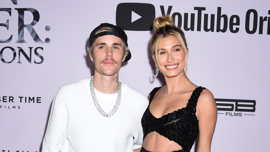 Hailey Baldwin Wearing a Black Dress With Justin Bieber in a White Shirt and Pink Pants