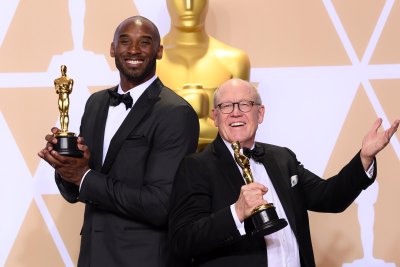 Kobe Bryant With His Statue at the Oscars