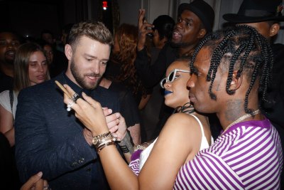 Travis Scott Hugs Rihanna at Party