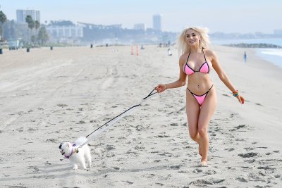 Courtney Stodden Running on the Beach with her Dogs Courtney Stodden Details Hate and Judgement She Received When She First Became Famous in New Memoir