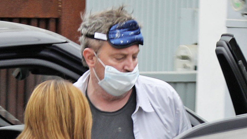 Matthew Perry Looks Exhausted in Sleeping Mask as Friend Helps Him out of a Car