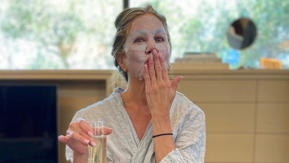 Jennifer Aniston Wears Facemask to Celebrate Emmys at Home