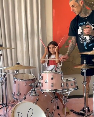 Travis Barker Helps Penelope Disick Learn to Play the Drums