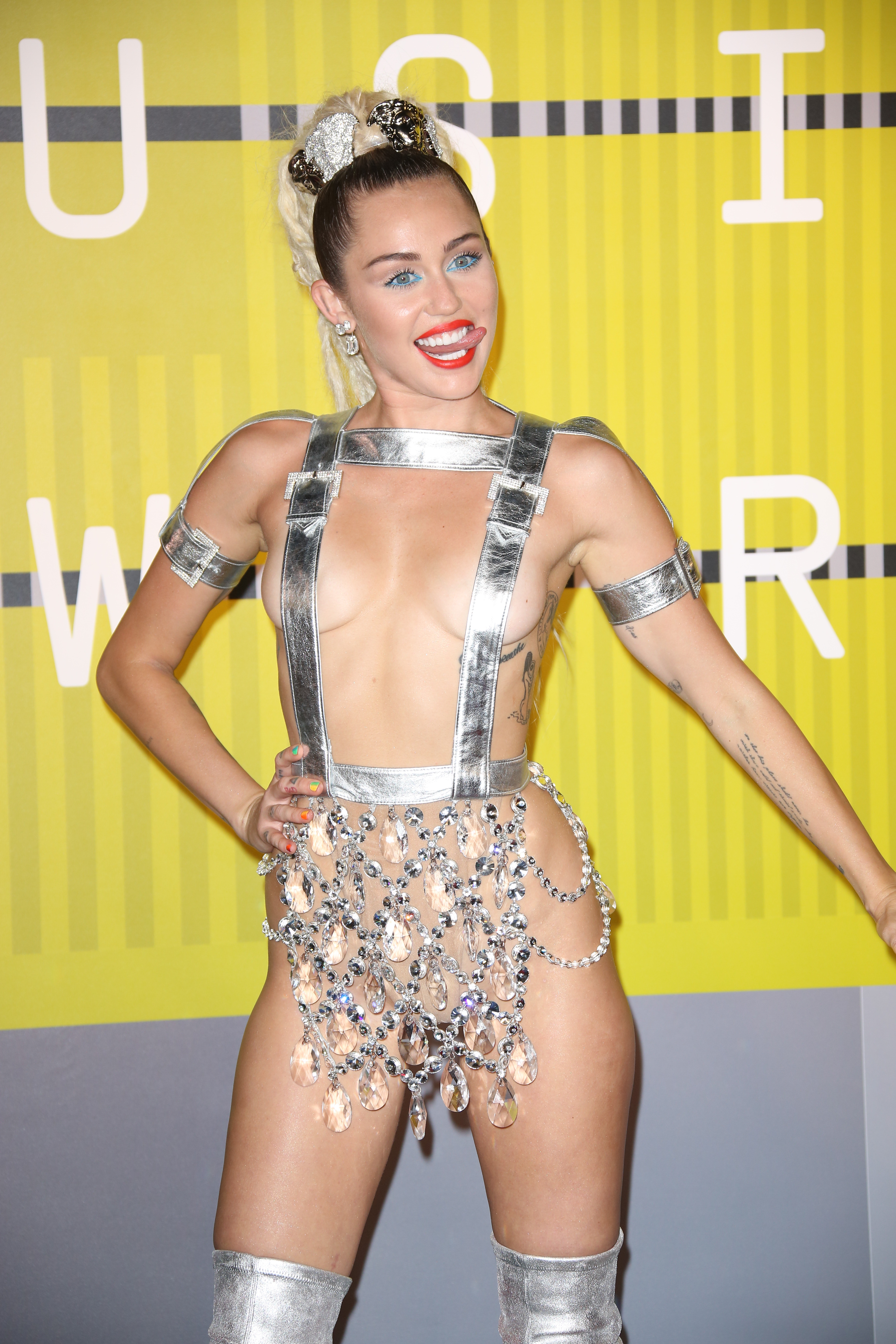 Miley Cyrus Showing Tits