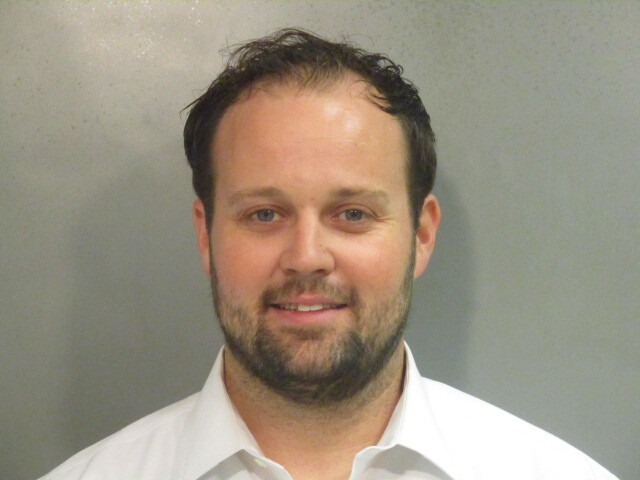 Disgraced TV star Josh Duggar smiles in mugshot after guilty verdict in child pornography trial