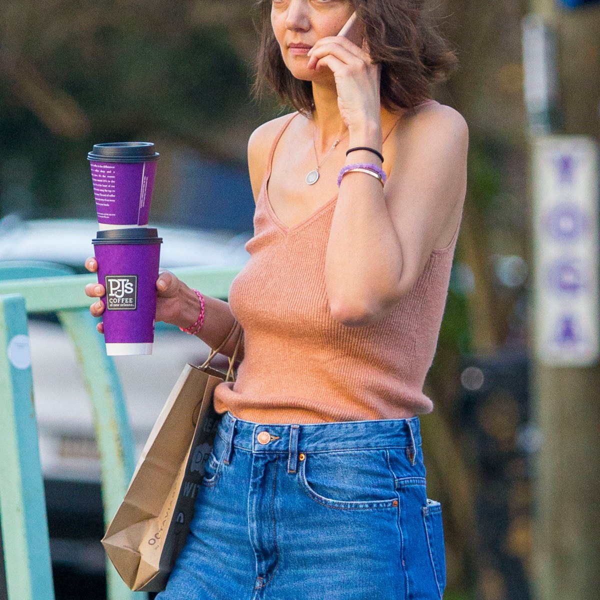 https://www.intouchweekly.com/wp-content/uploads/2022/07/Katie-Holmes-Orange-TankTop-Braless-New-Orleans-December-2018.jpg?resize=1200%2C1200&quality=86&strip=all