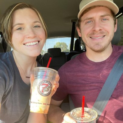 Joy-Anna Duggar and Austin Forsyth holding iced coffees