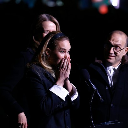 Jennifer Lawrence with her hands over her mouth in shock after she suffered a wardrobe malfunction during the Saks Lighting Ceremony.