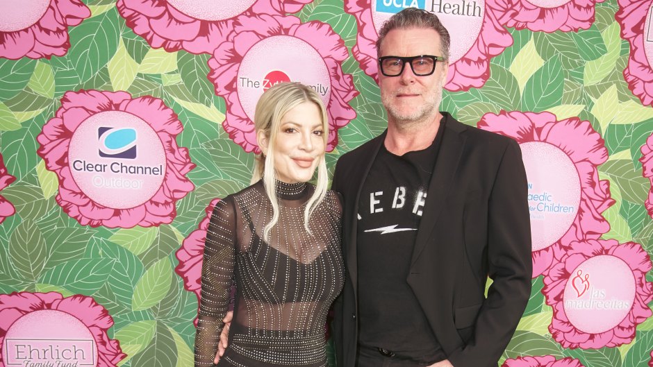 Tori Spelling and Dean McDermott pose for photos at a gala. Dean claims Tori letting a pig sleep in their bed led to the demise of their marriage.